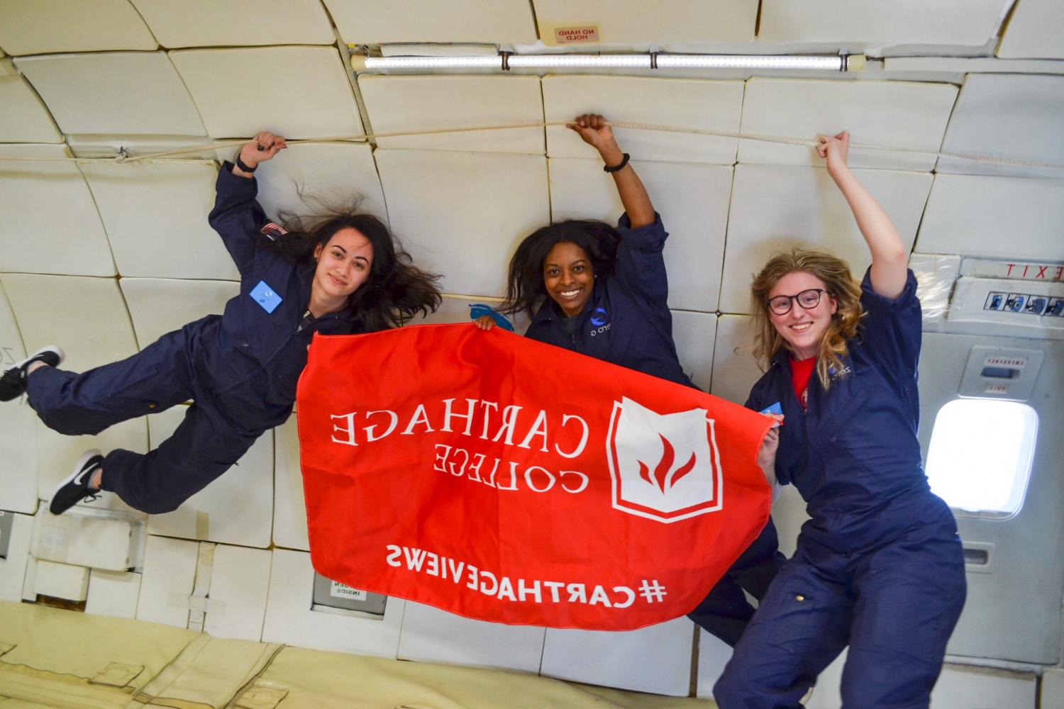 Carthage Microgravity Team during a zero-g flight in support of the team's MPG-TRIO experiment.